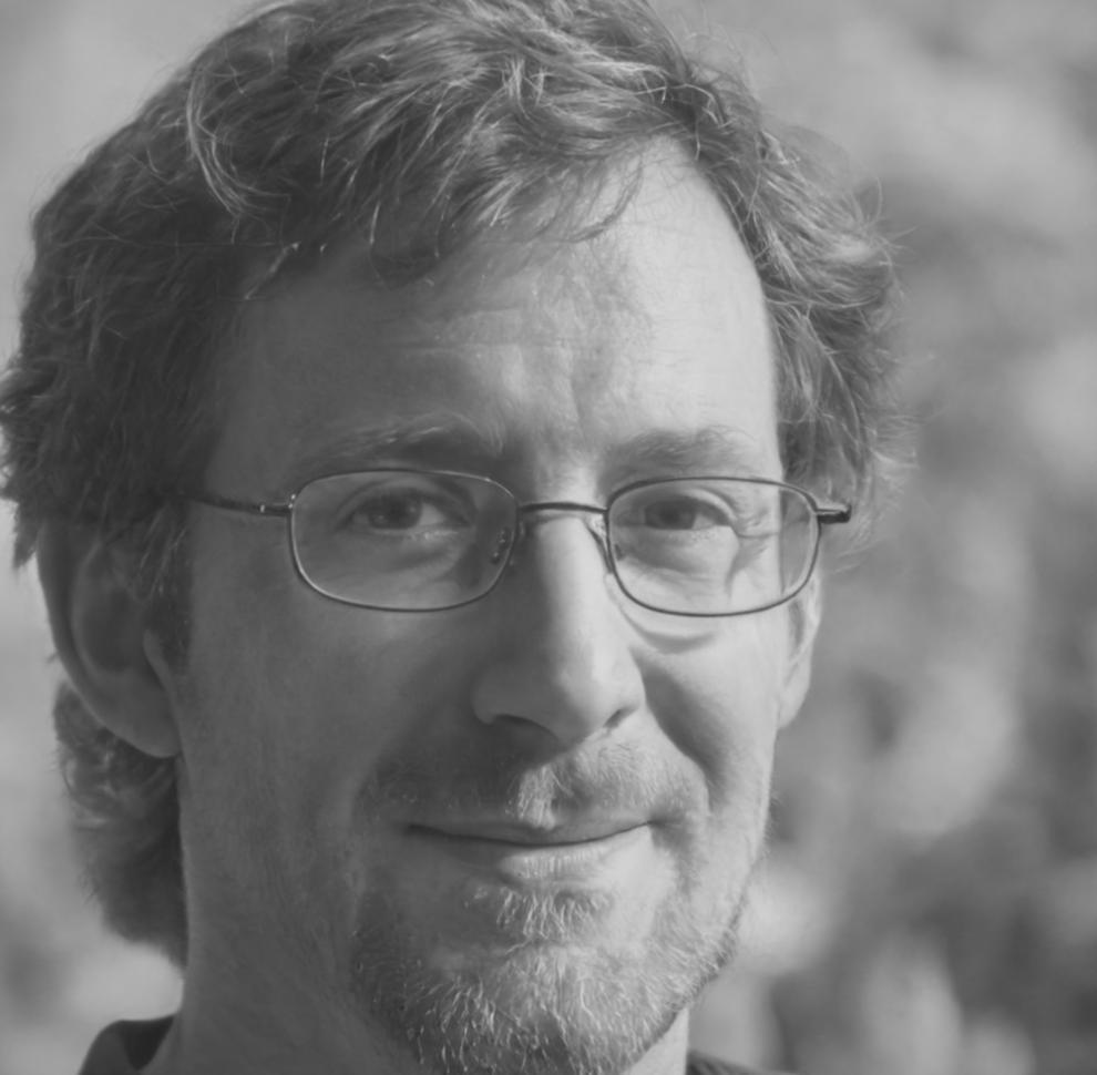 Henrik Sundqvist reviewing CRM dashboard on laptop