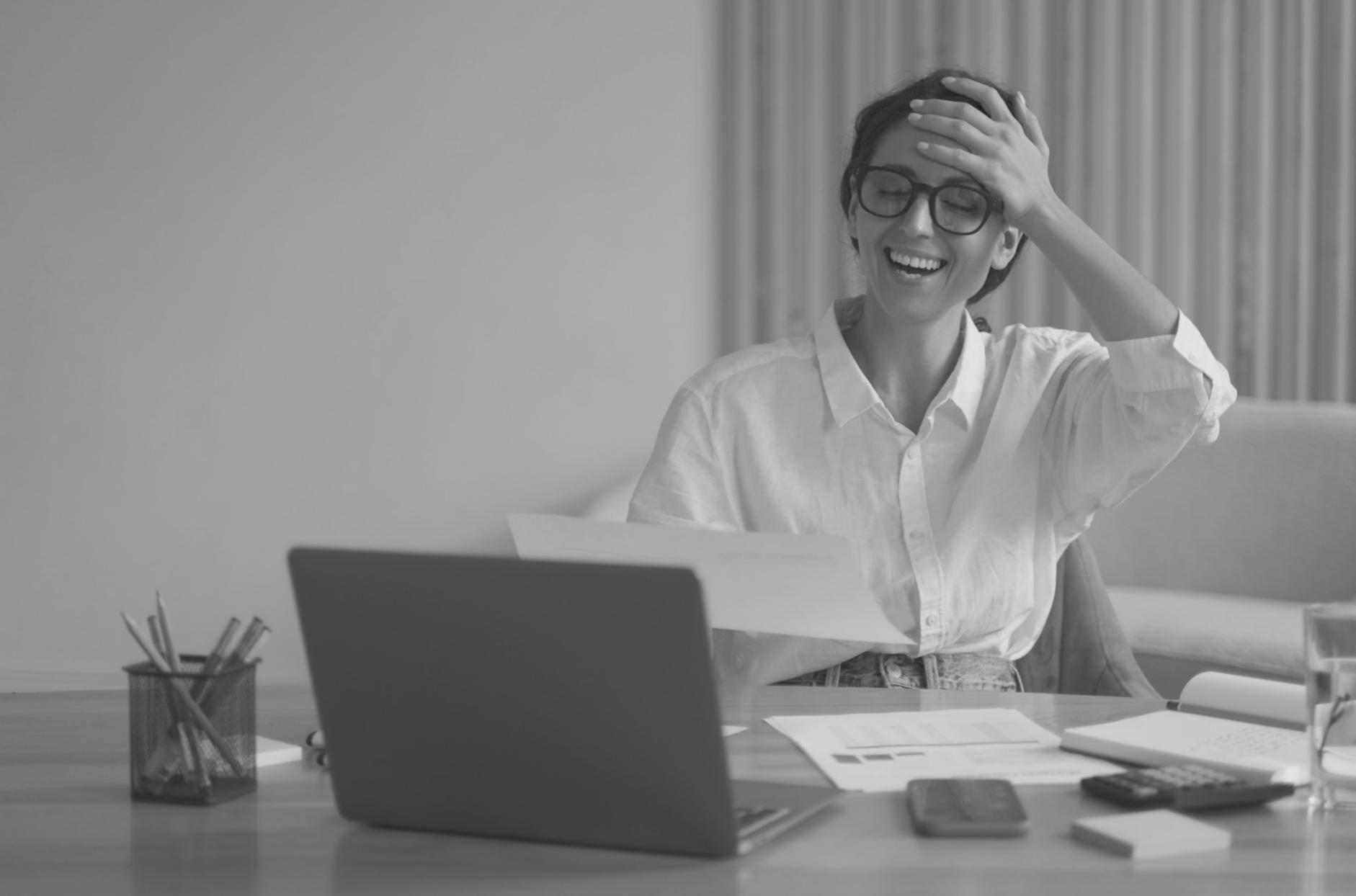 Business professional reviewing CRM dashboard showing customer interaction data and relationship management tools